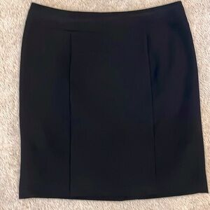 George black straight black knee length skirt. Poly rayon bland w/some spandex